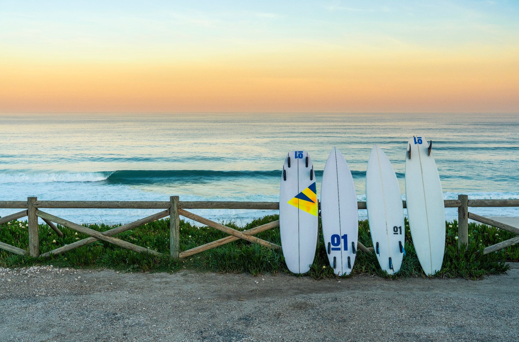Custom surfboards overlooking the ocean at sun rise.
