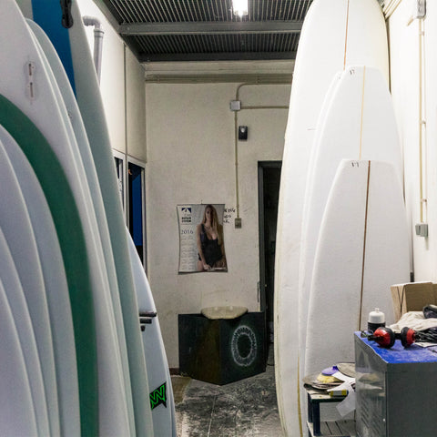 Behind the scenes of a surfboard factory. 